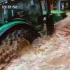 Man arrested after tractor filmed being driven through floodwater during Storm Bert